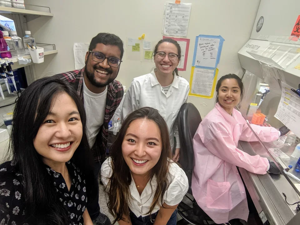 Lab members take a group selfie in the lab