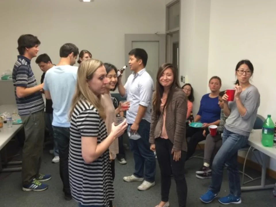 2014/12/4 - Teitell lab celebrates a PhD defense with food and drink in a conference room