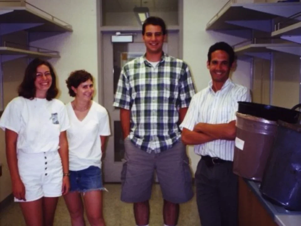 a photo taken in 1999 of Dr. Teitell standing in his new lab with three other lab members